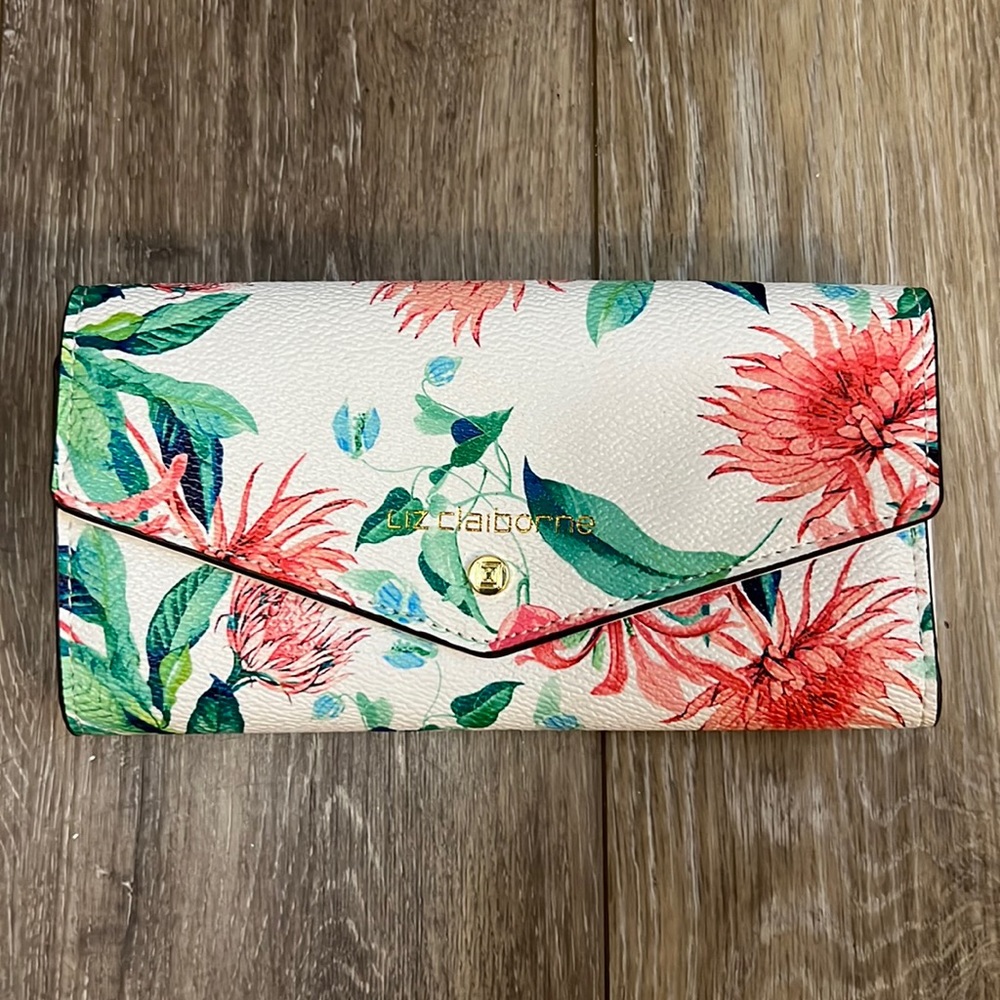 White flowered wallet lots of space for cards only used once no stains